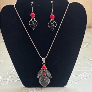 Zebra jasper biwa pearl necklace and black onyx and coral earrings.